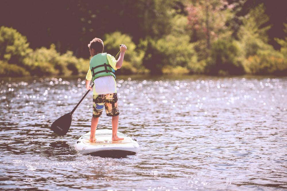 Stand-up paddleboarding on the lake